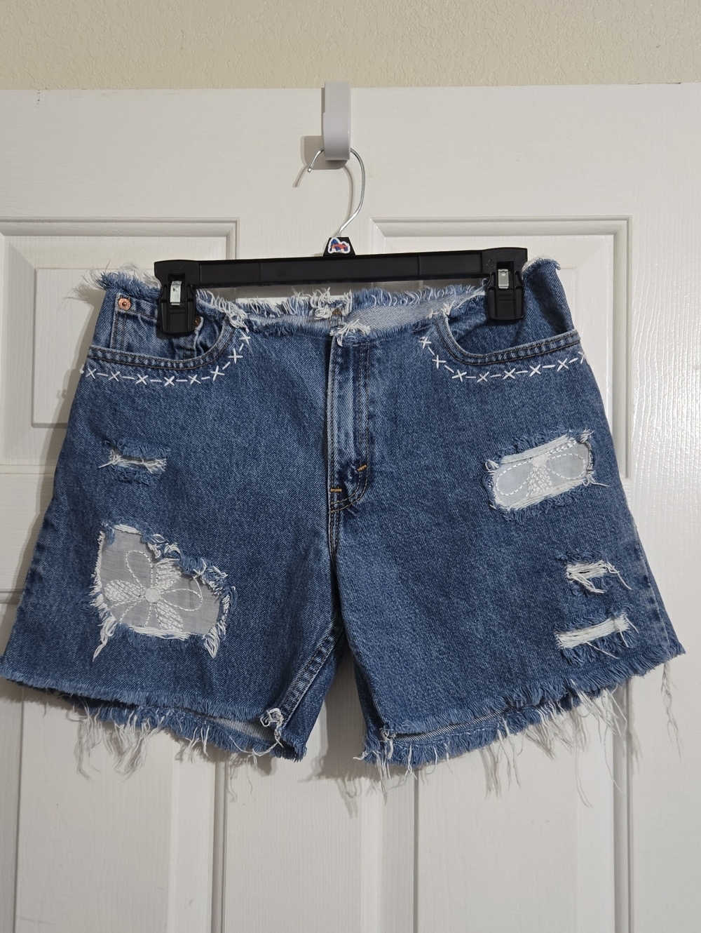 Levi's Blue Distressed Denim Shorts with White Lace Patches
